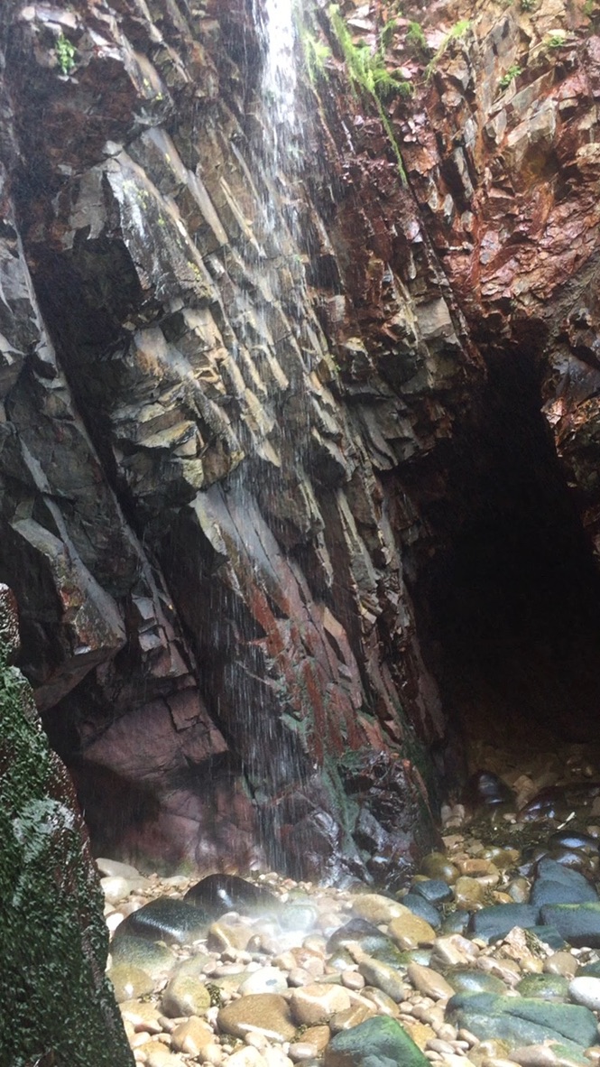 Sea cave waterfall